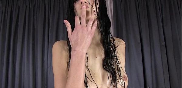  Raven haired babe Mia loves to drench herself in warm golden pee